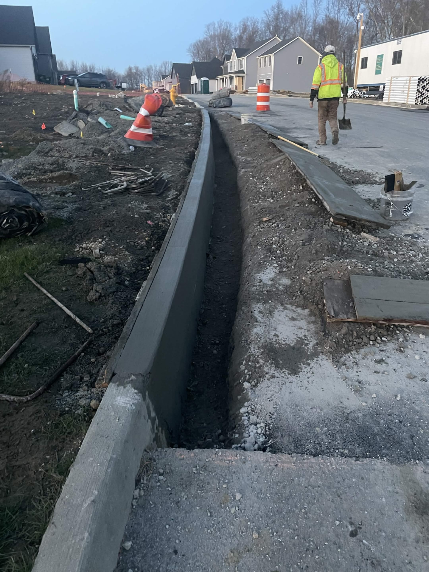 Concrete curb line finished along a new roadway