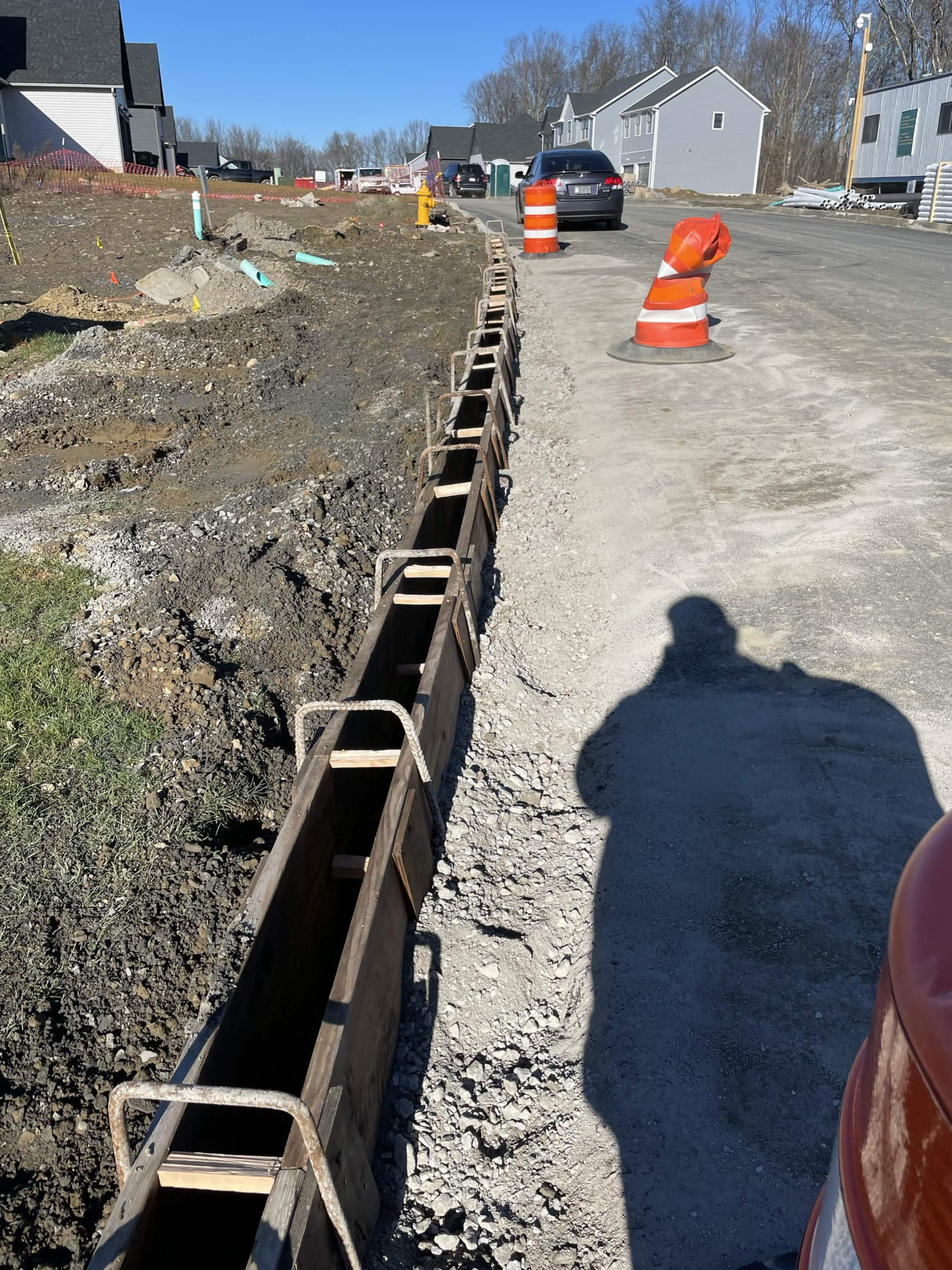 Curb forms and trench prepared for a concrete pour