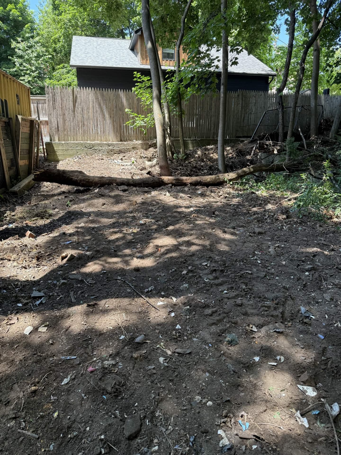 Cleared back lot with debris hauled away