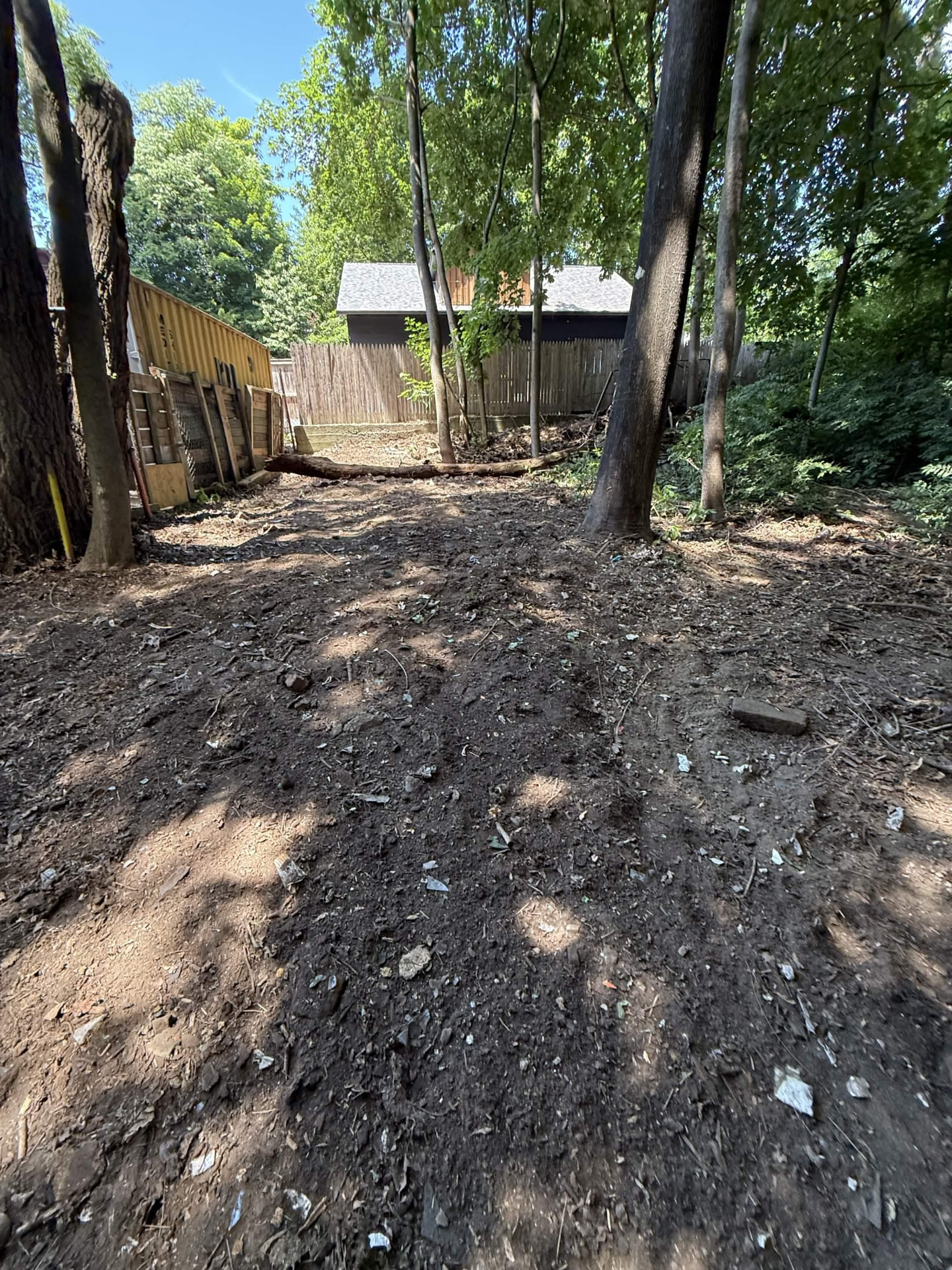 Overgrown yard fully cleared and graded