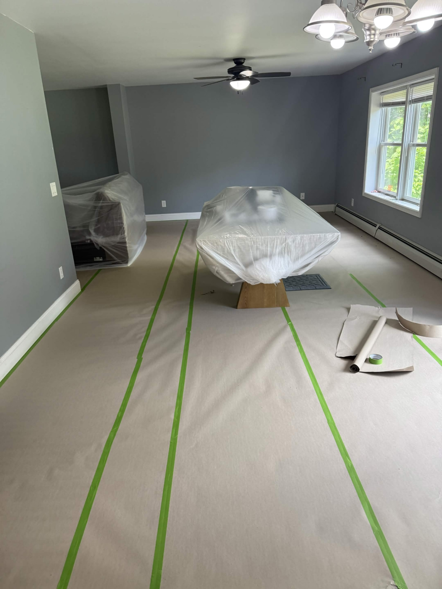 Room masked and protected before painting